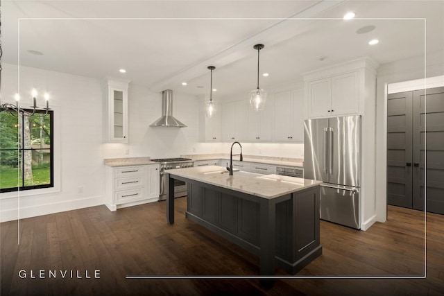 237 Glassy Rock Ln, Glenville, NC 28736 - kitchen featuring premium appliances, wall chimney range hood, white cabinets, and recessed lighting
