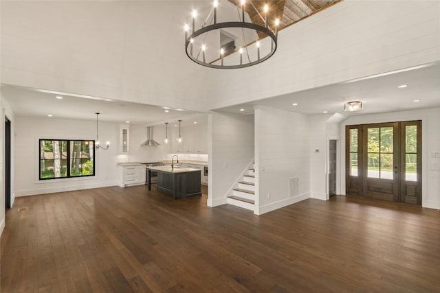 237 Glassy Rock Ln, Glenville, NC 28736 - living area featuring a chandelier, dark wood-type flooring, a high ceiling, and recessed lighting