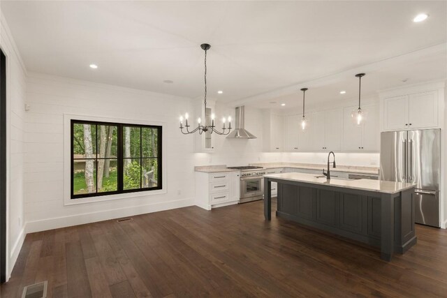 237 Glassy Rock Ln, Glenville, NC 28736 - kitchen with stainless steel appliances, wall chimney exhaust hood, light countertops, white cabinets, and recessed lighting