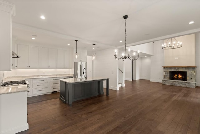 237 Glassy Rock Ln, Glenville, NC 28736 - kitchen with appliances with stainless steel finishes, light countertops, a chandelier, dark wood-type flooring, and recessed lighting