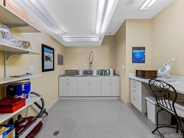 kitchen featuring white cabinetry