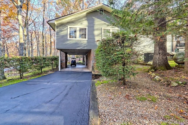 view of front of home featuring a carport