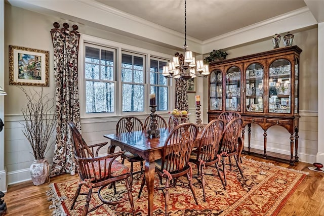 35 Creekwood Ct, Highlands, NC 28741 - dining room featuring a chandelier, wood finished floors, and crown molding