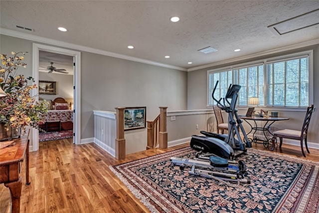 35 Creekwood Ct, Highlands, NC 28741 - exercise room featuring light wood finished floors, crown molding, baseboards, recessed lighting, and a textured ceiling
