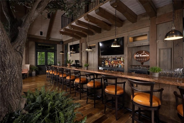 35 Creekwood Ct, Highlands, NC 28741 - indoor wet bar with wood walls, wood finished floors, wooden ceiling with exposed beams, and decorative light fixtures