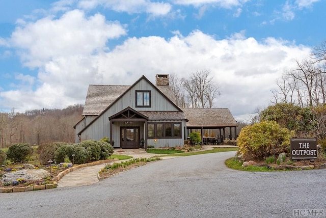 359 Outpost Trl, Glenville, NC 28736 - view of building exterior featuring gravel driveway