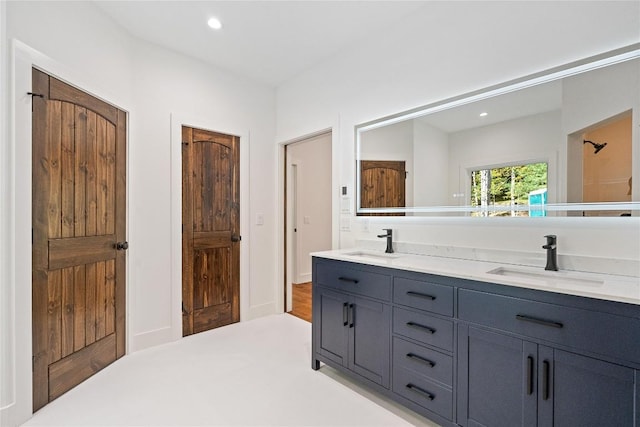 2147 Pilot Knob Rd, Glenville, NC 28736 - full bath featuring double vanity, a sink, and recessed lighting