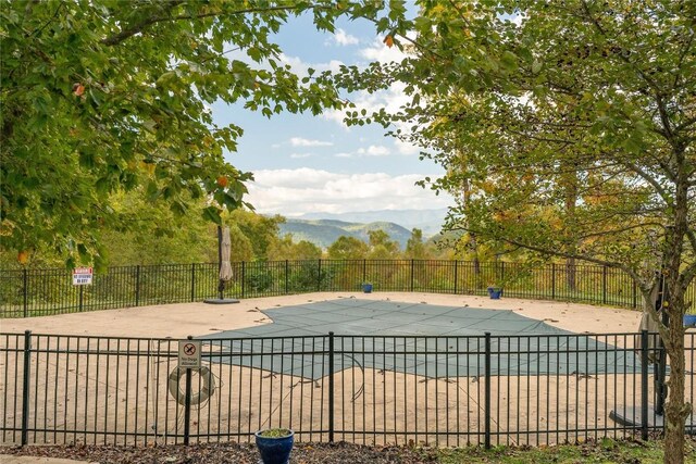 2147 Pilot Knob Rd, Glenville, NC 28736 - pool with a patio, a mountain view, and fence