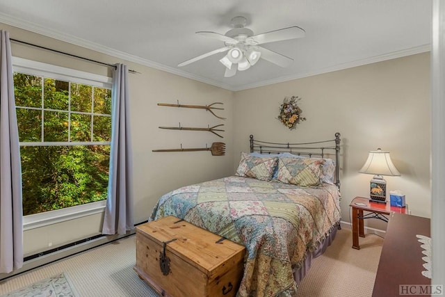 bedroom with multiple windows, carpet, and crown molding