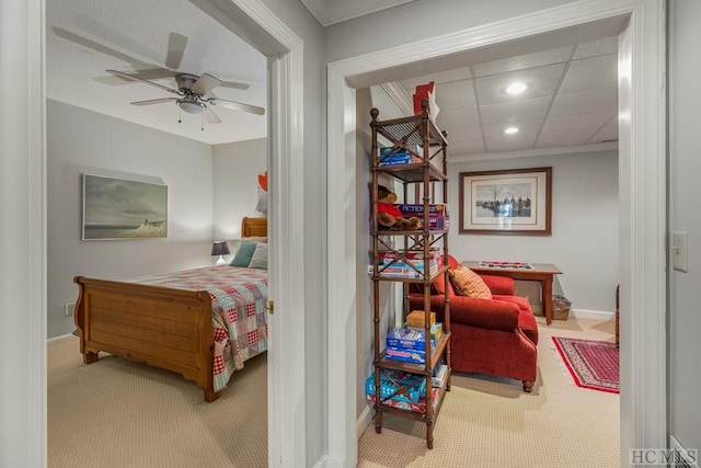 bedroom with carpet, a paneled ceiling, recessed lighting, a ceiling fan, and baseboards