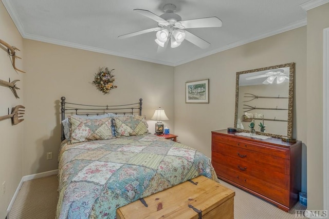 bedroom with baseboards, carpet floors, ceiling fan, and crown molding