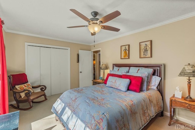 bedroom with a closet, carpet, a ceiling fan, and crown molding