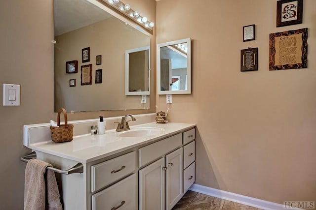 bathroom featuring tile patterned floors and vanity