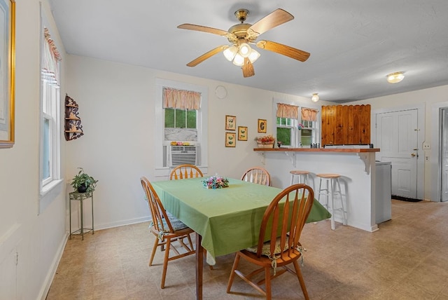 232 Dobson Rd, Franklin, NC 28734 - dining area featuring healthy amount of natural light, light flooring, a ceiling fan, and cooling unit