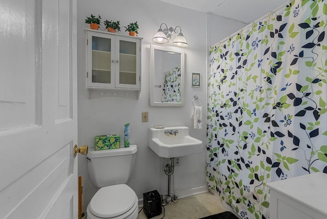 232 Dobson Rd, Franklin, NC 28734 - full bathroom featuring toilet, a shower with shower curtain, and a sink