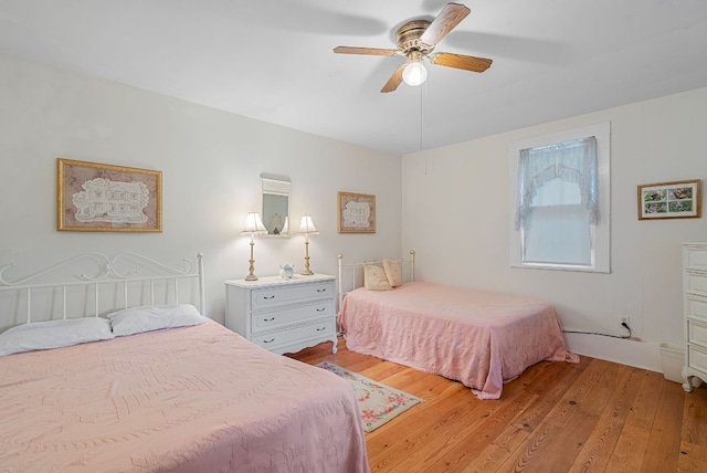 232 Dobson Rd, Franklin, NC 28734 - bedroom with light wood-style flooring and a ceiling fan