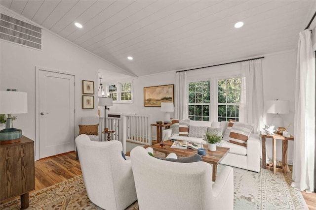 living room featuring light wood finished floors, lofted ceiling, recessed lighting, and wooden ceiling