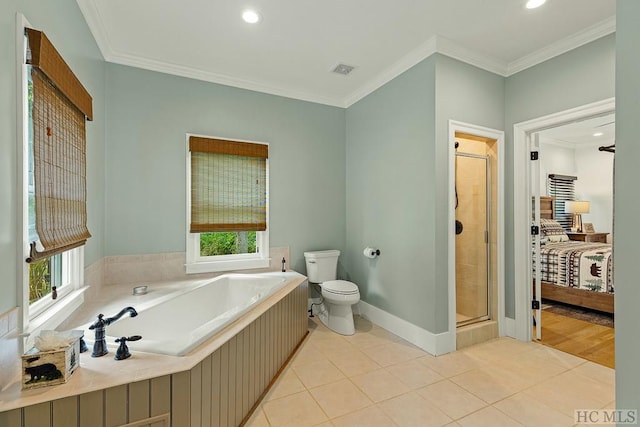 bathroom featuring tile patterned flooring, ornamental molding, toilet, and separate shower and tub