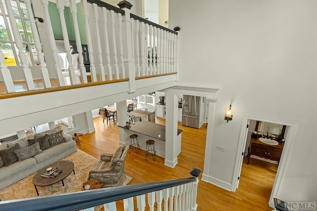 interior space featuring sink and light hardwood / wood-style flooring