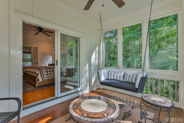 sunroom / solarium with ceiling fan