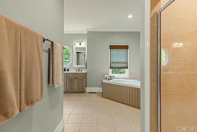 23 Drystack Way, Cashiers, NC 28717 - bathroom with ornamental molding, tile patterned floors, a garden tub, vanity, and plenty of natural light
