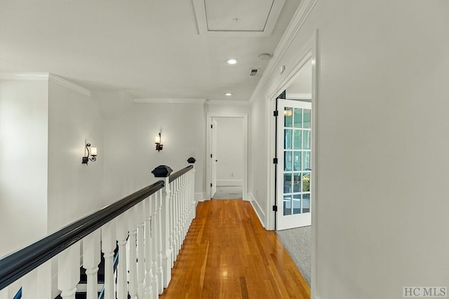 23 Drystack Way, Cashiers, NC 28717 - hallway featuring light wood-style floors, crown molding, recessed lighting, and an upstairs landing