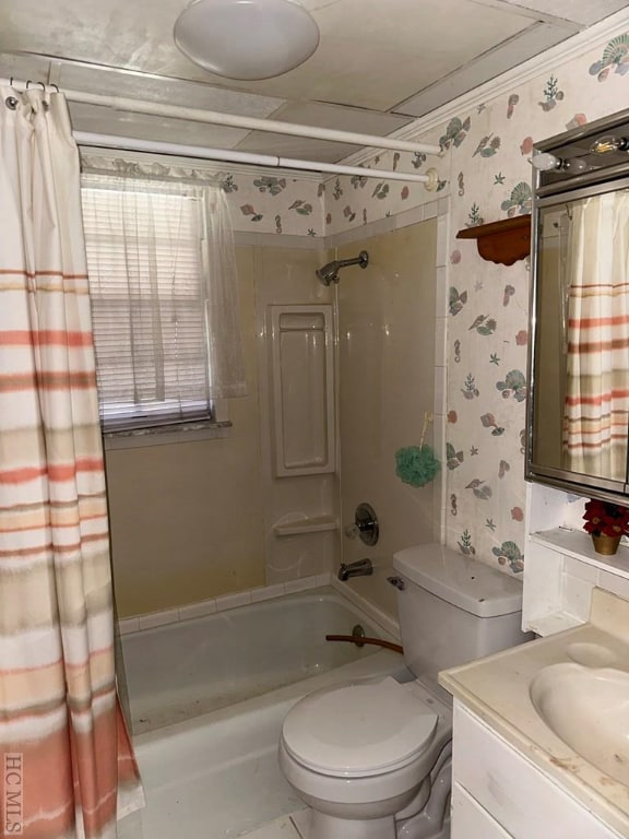 full bathroom with toilet, vanity, and shower / bath combination with curtain