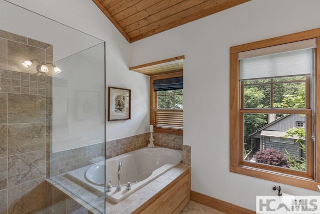full bath with wooden ceiling, a jetted tub, lofted ceiling, and baseboards