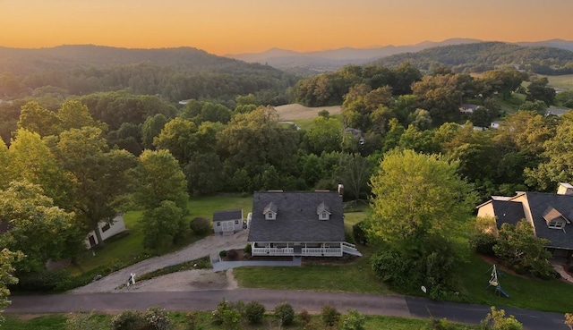 150 Lauren Ln, Franklin, NC 28734 - view of subject property featuring a mountainous background and a heavily wooded area