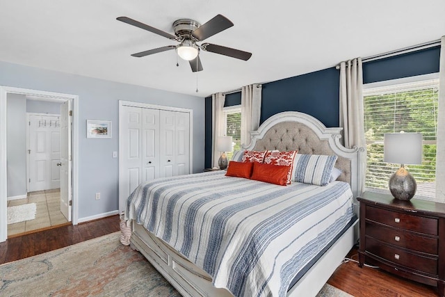 150 Lauren Ln, Franklin, NC 28734 - bedroom featuring wood finished floors, a closet, and ceiling fan