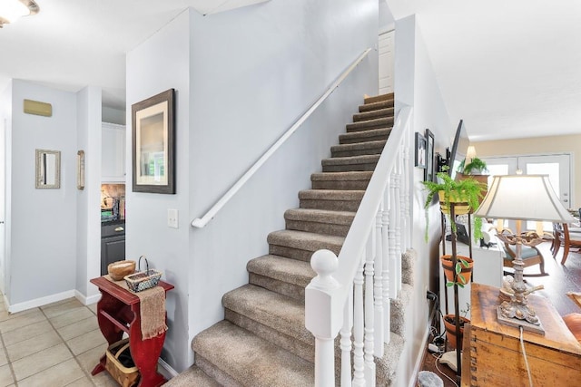 150 Lauren Ln, Franklin, NC 28734 - stairway with tile patterned floors and baseboards