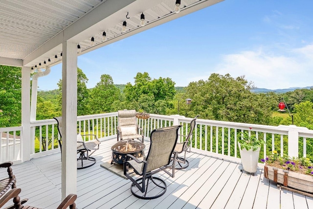 150 Lauren Ln, Franklin, NC 28734 - wooden terrace with a fire pit