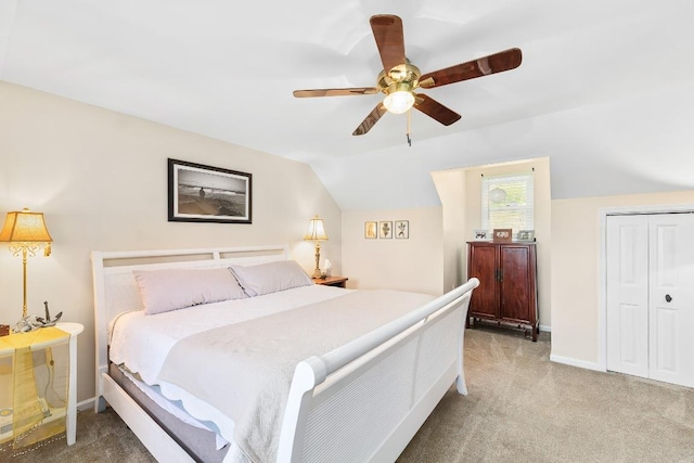 150 Lauren Ln, Franklin, NC 28734 - bedroom featuring light colored carpet, vaulted ceiling, a ceiling fan, and a closet