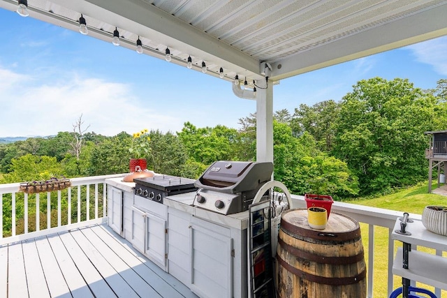150 Lauren Ln, Franklin, NC 28734 - wooden terrace with a grill and view of wooded area