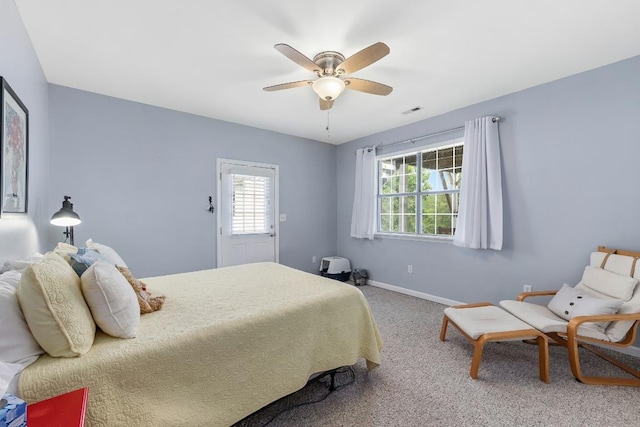 150 Lauren Ln, Franklin, NC 28734 - carpeted bedroom featuring multiple windows and a ceiling fan