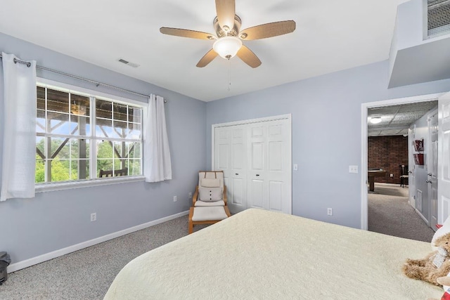 150 Lauren Ln, Franklin, NC 28734 - carpeted bedroom with a closet and ceiling fan