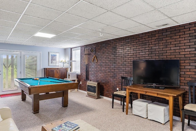 150 Lauren Ln, Franklin, NC 28734 - playroom featuring brick wall, a drop ceiling, pool table, carpet floors, and a wood stove