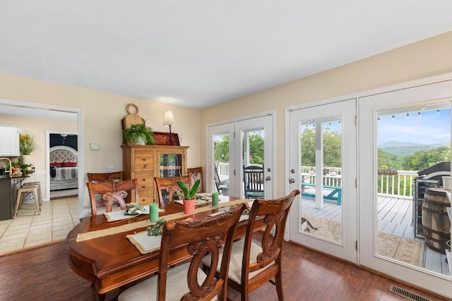 150 Lauren Ln, Franklin, NC 28734 - dining room with french doors and light wood-type flooring