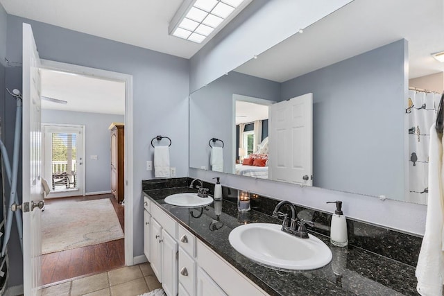 150 Lauren Ln, Franklin, NC 28734 - ensuite bathroom with double vanity and tile patterned floors
