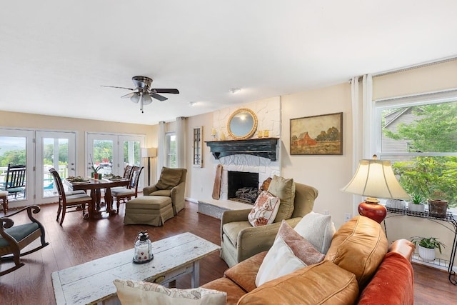 150 Lauren Ln, Franklin, NC 28734 - living area with healthy amount of natural light, ceiling fan, a fireplace, and wood finished floors