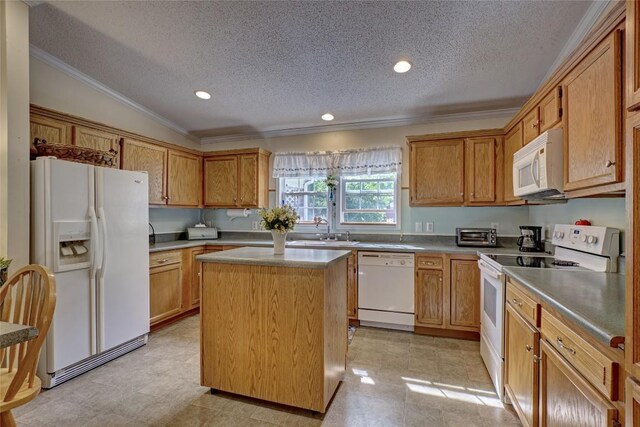 264 Cole Mountain Cir, Highlands, NC 28741 - kitchen featuring white appliances, a textured ceiling, crown molding, a center island, and recessed lighting