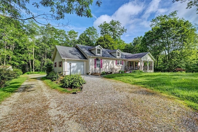 264 Cole Mountain Cir, Highlands, NC 28741 - cape cod-style house featuring gravel driveway, an attached garage, and a porch