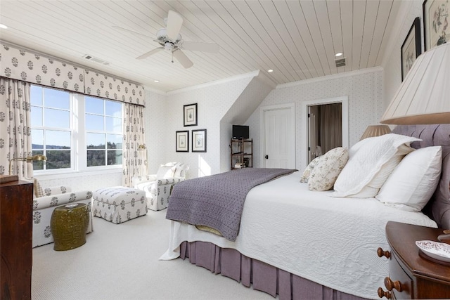 bedroom featuring visible vents, carpet floors, wooden ceiling, crown molding, and wallpapered walls