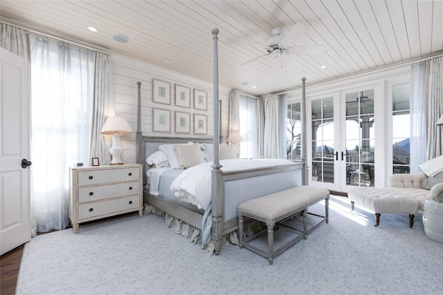 bedroom featuring a ceiling fan, wooden ceiling, recessed lighting, and french doors