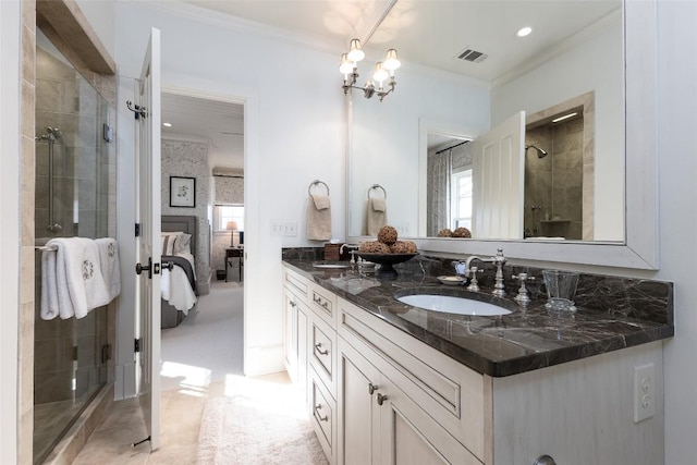 full bathroom featuring visible vents, ornamental molding, ensuite bathroom, a sink, and a shower stall