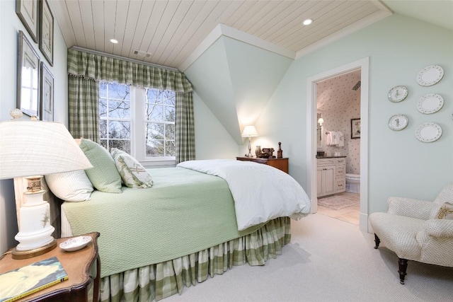 bedroom featuring wood ceiling, lofted ceiling, light carpet, recessed lighting, and ensuite bathroom