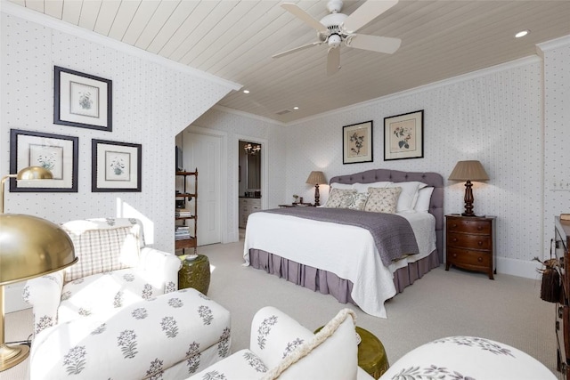 bedroom with wallpapered walls, crown molding, and light carpet