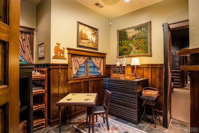 bar featuring wood walls