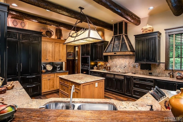 kitchen featuring premium range hood, sink, pendant lighting, light stone countertops, and black appliances