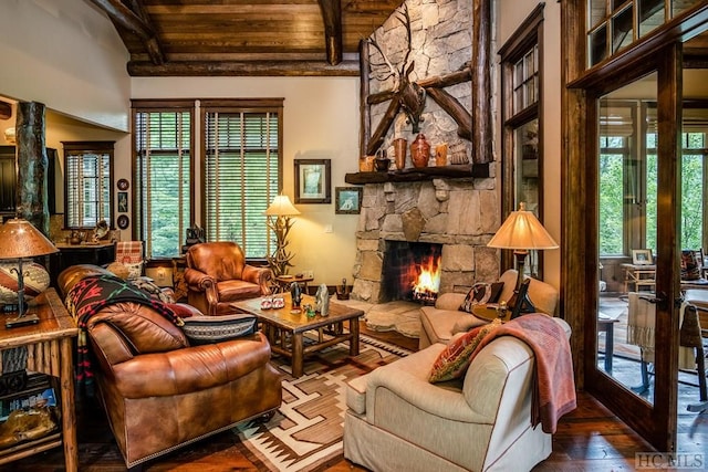 living room with a fireplace, wood ceiling, wood-type flooring, and lofted ceiling with beams